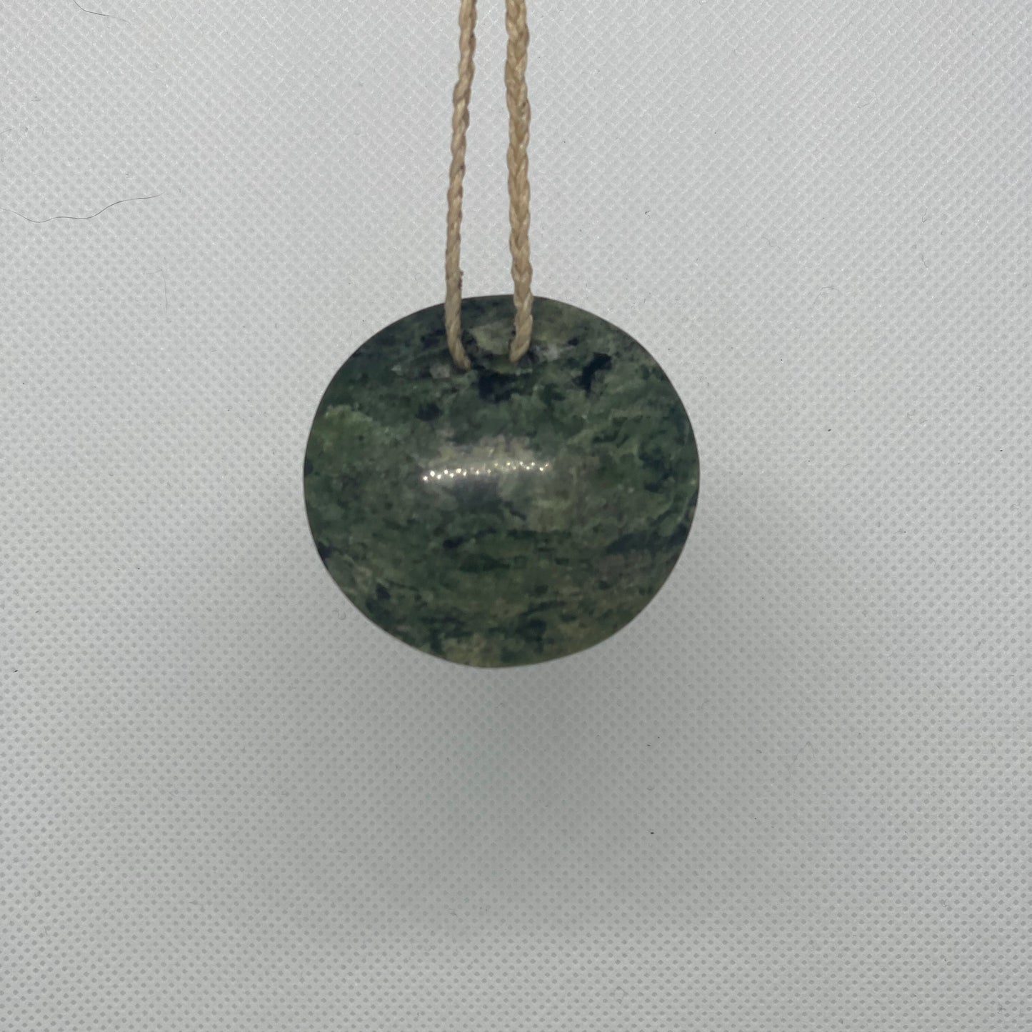 Serpentine Pounamu Rakaunui / Porowhita (Circle) - Carved by Hemi