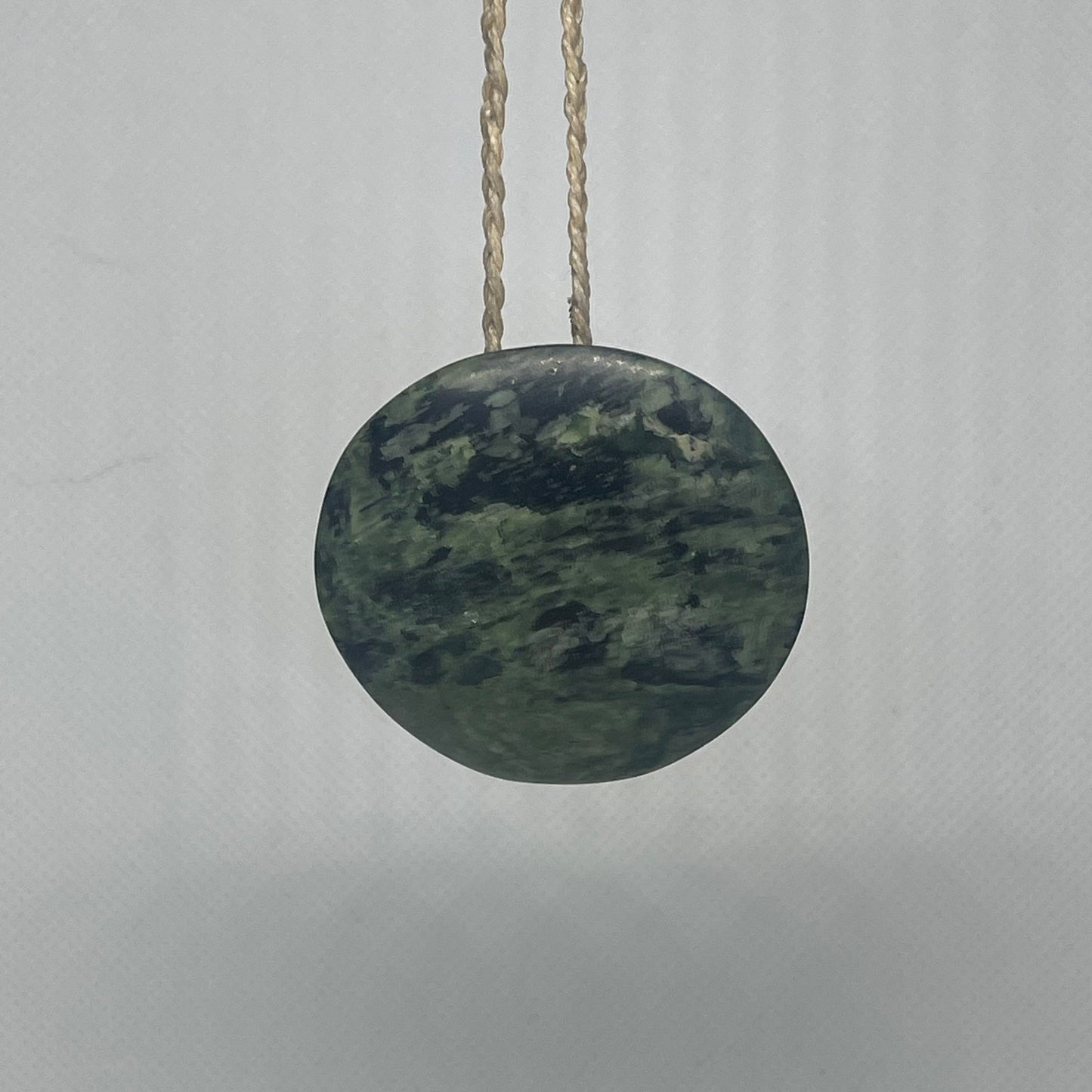 Serpentine Pounamu Rakaunui / Porowhita (Circle) - Carved by Hemi